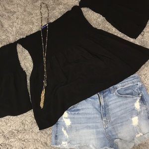 Flirty black top